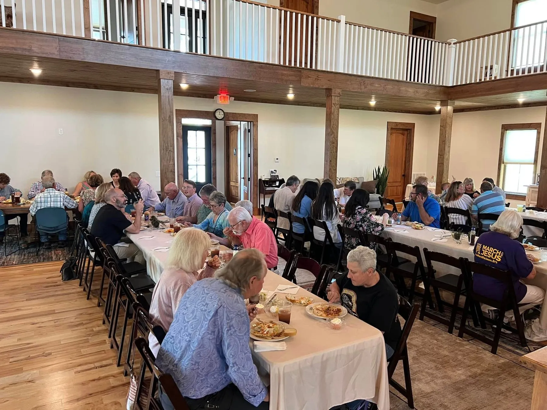 Neighbors sharing a long table at the Mother’s Day lunch